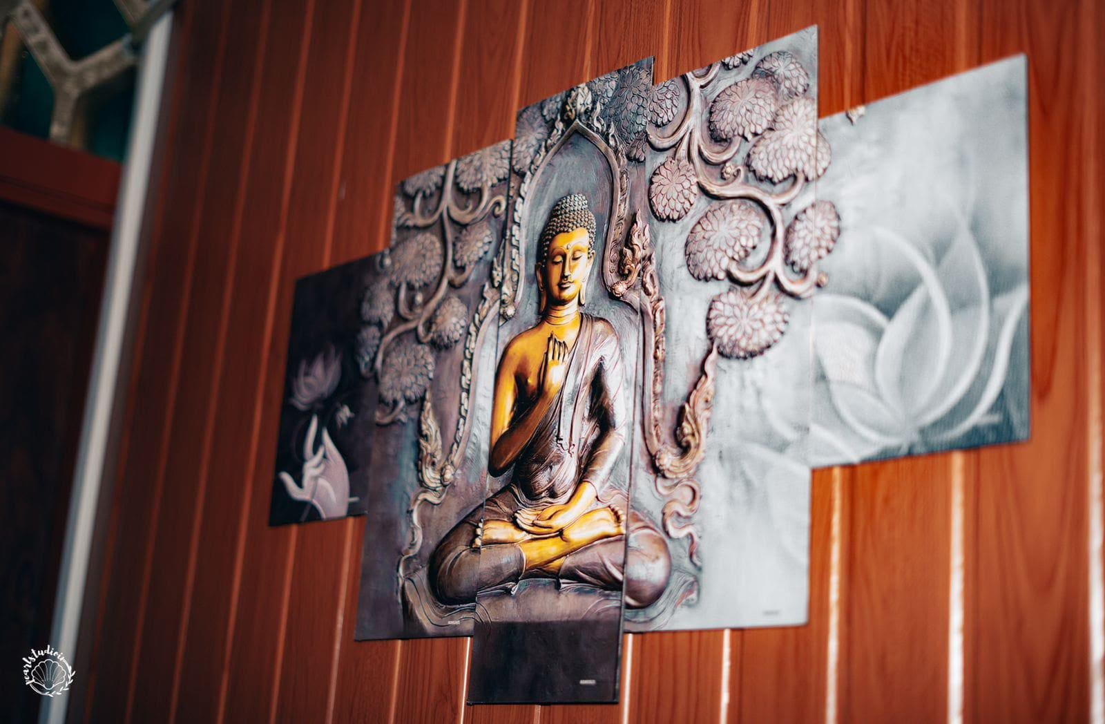 Gold Buddha multi-panel wall art in meditation pose — embodying the philosophy of Lavella Wellness